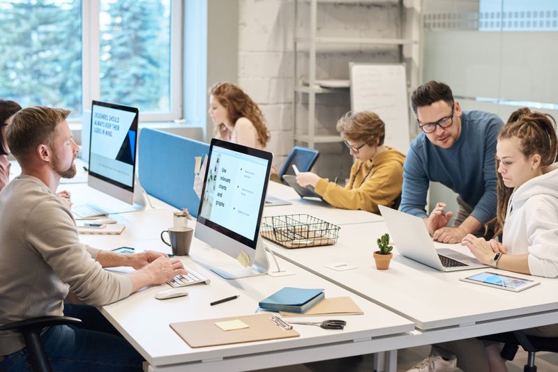 Team developing ideas in a collaborative workspace