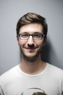 Illustrative stock portrait, not the reviewer